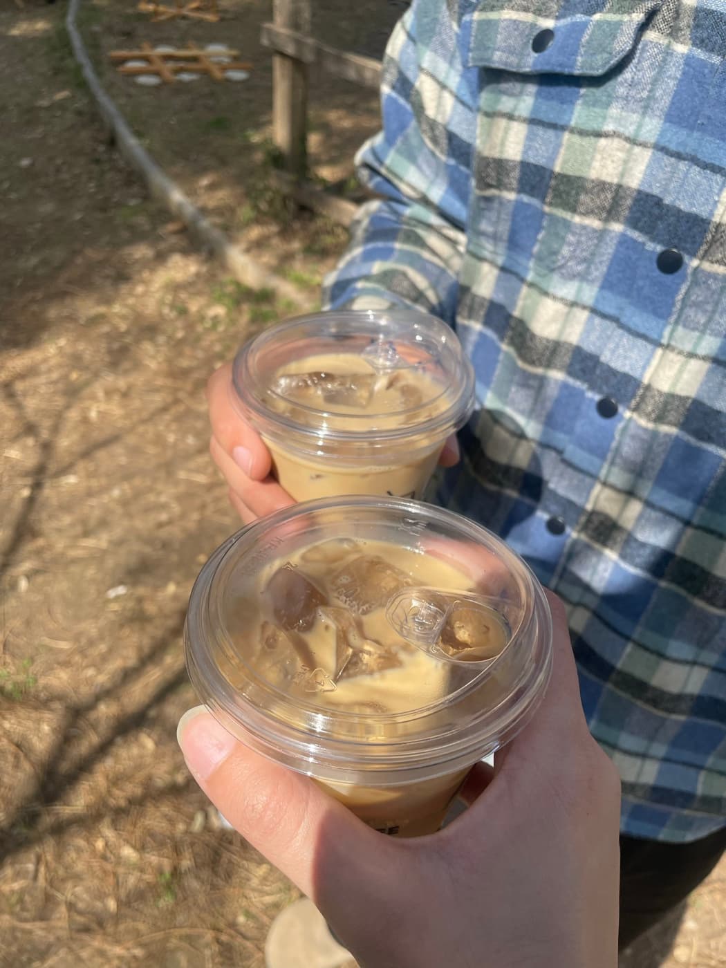 Coffee in hand, outdoors